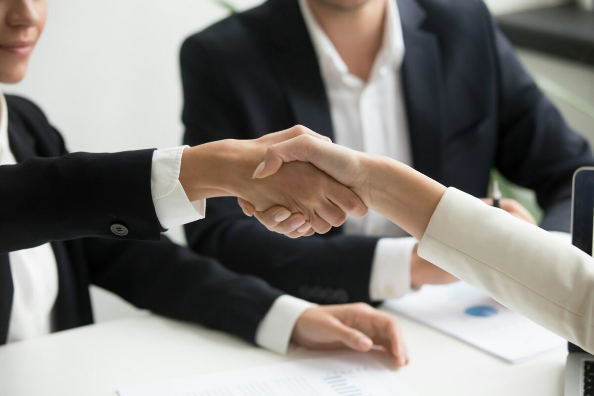 Two businessmen shaking hands